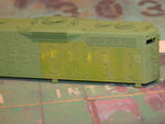 Left side after second coat of paint, which was done using a technique similar to sponge painting after masking the appropriate hood doors. I used a piece of packing foam to dab small amounts of paint on, keeping a close eye on prototype photos to determine how much of the lettering should remain visible. The paint here was a mix of one part Floquil Light Green and about four parts UP Armour Yellow.