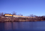 A pregame run of the Hawkeye Express skirts the edge of the lake east of Mormon Trek Ave in Coralville, IA on 11/6/04.