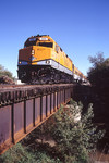 The Ski-Train is making a post-game run of the Hawkeye Express over Clear Creek in Coralville, IA on 10/2/04.