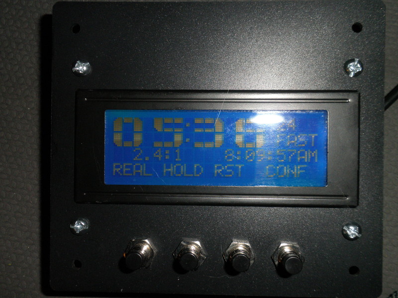 Master unit.  It supports, among other things, 12 or 24 hour displays (individually configurable for real time and fast time), three configurable reset times, and a fast clock ratio configurable down to tenths. I simulate a six hour prototype day in a 2.5 hour session, so I set my ratio to 2.4/1 (6 divided by 2.5 = 2.4).  I plan to mount it in my dispatcher's office.