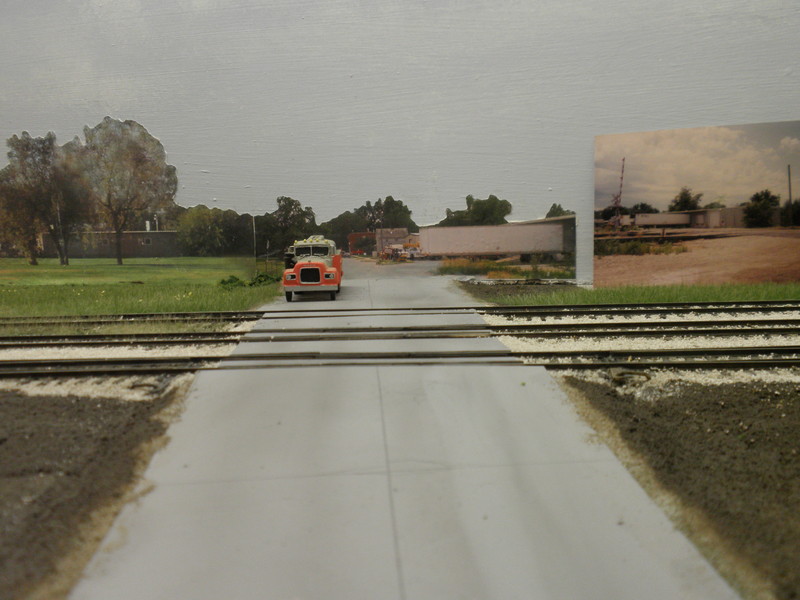 Looking south along Locust St.  I used Pan Pastels on the backdrop photos to match the 2D and 3d roads.