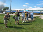 Photo line at Ford Rd., featuring Josh Fullbright with the buzz cut and yellow shirt, and Tim Fullbright in "Rock" blue shirt and white cap.