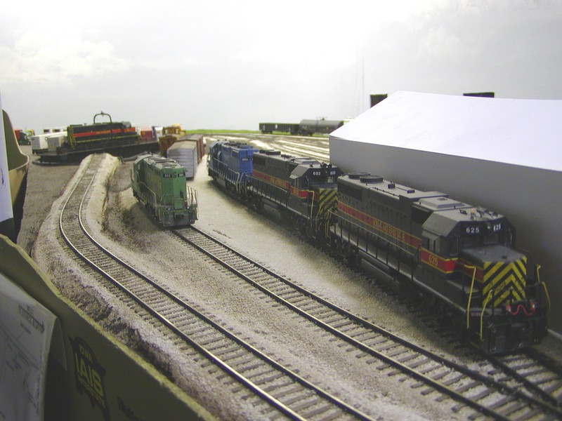 Bluffs Yard engine facility with new turntable in the background.  The enginehouse roof is just set in place for a temporary test fit.