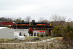 The CBBI crosses the Iowa River Bridge with 507 in charge.