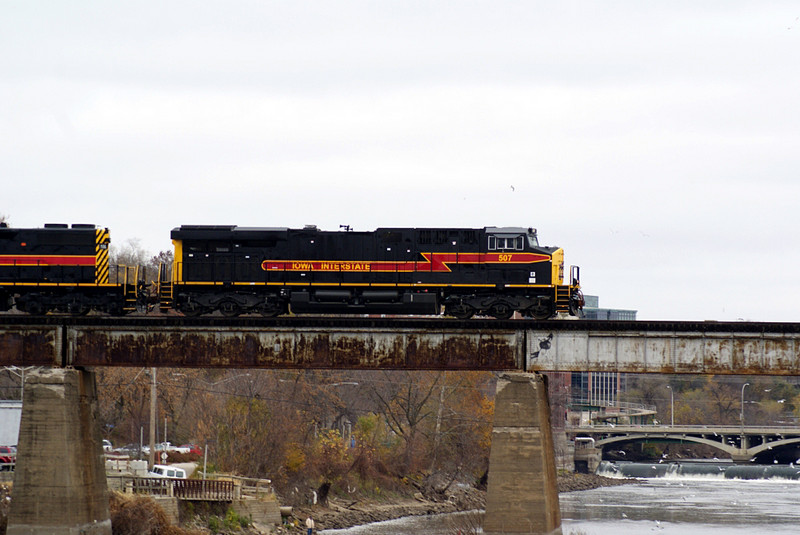 The CBBI crosses the Iowa River Bridge with 507 in charge.