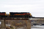 The CBBI crosses the Iowa River Bridge with 507 in charge.