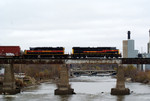 The CBBI crosses the Iowa River Bridge with 507 in charge.
