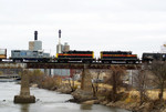 The flanges of 486, 403, and 495 roll across the Iowa River Bridge for the last time.