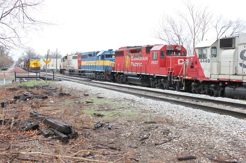 ICE local with a neat consist is waiting at Mo. Div. Jct. for the WB to go by.  April 10, 2013.