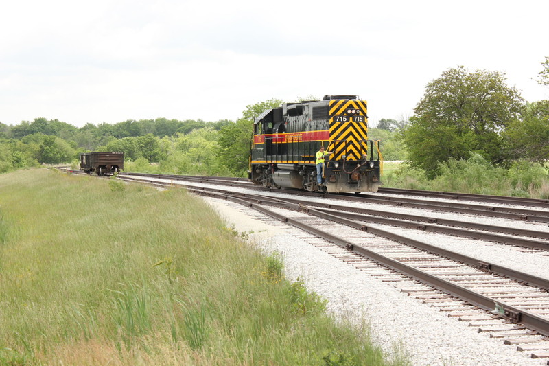 On the way back to Newton they stopped to grab a car at Merchant's; here they're running around the car.