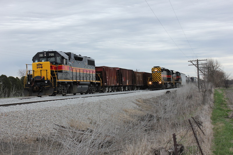 WB passes the ballast train at Twin States, April 15, 2013.