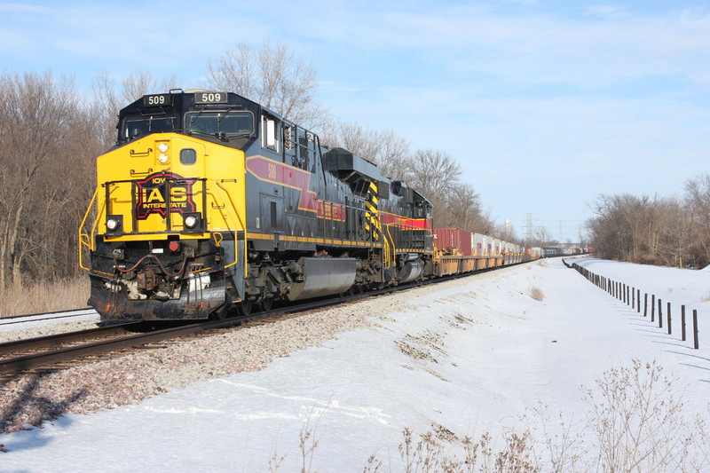 With the head end stopped at the mp210 crossing and their rear end still well east of the east switch, the crew is getting instructions on where to put their train.