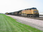 EB passes the coal train's pusher at Silvis, July 1, 2011.