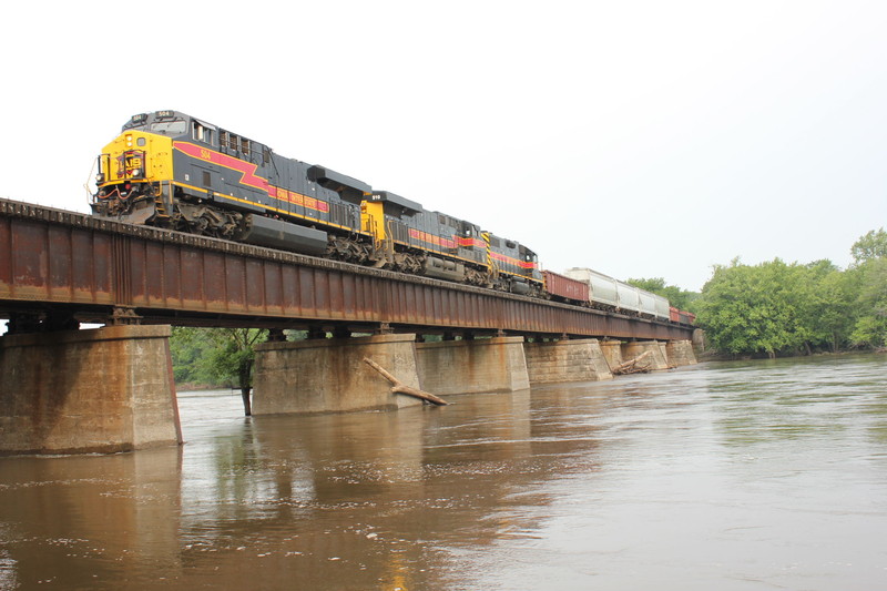 EB crosses the Cedar River, June 21, 2013.  The 700 and several head end cars will be set out at N. Star for the Wilton Local.