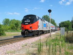 Inbound Amtrak charter from Chicago passes the ex-RI signal at Carbon Cliff.