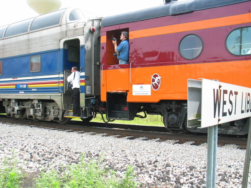 Car host Dave is ready to drop his dome car's stepbox as soon as the train stops.