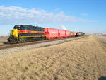 NS train passes the Rocket at the west end of the Annawan ethanol plant siding.