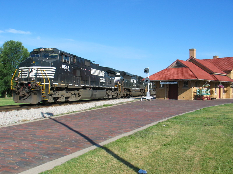 NS grain passes West Lib. depot, June 26, 2012.  I almost screwed this one up big time; composition is not quite what I wanted but it could've been much worse!