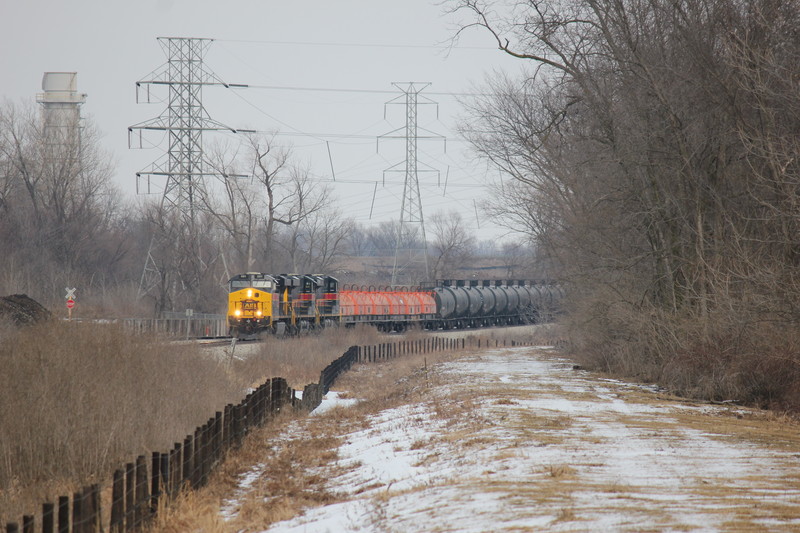 WB is rounding the little curve at mp209.5, behind Gerdau Ameristeel, Jan. 28, 2015.