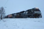 CP train 475 is working the new yard at Muscatine with a pair of NS motors for power and IAIS 516 in tow.