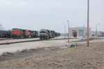 The crew has added their inbound engine to 2 more NSs and is picking up some additional Peoria manifest to add to their train.