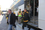 Trainboy Alex is "on the job" unloading passengers at the stadium.