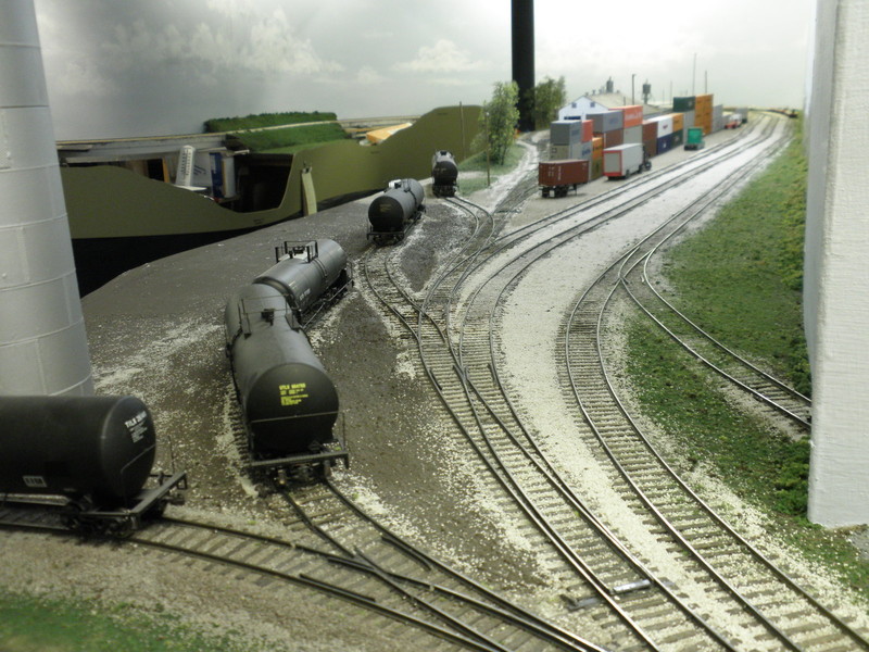 "After" view.  While the resulting S curve wasn't ideal, it isn't a problem from an operational standpoint for the 23000g tank cars and 4-axle yard power that plies that spur, and it'll be hidden behind structures when the scene is complete.