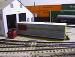 The model.  I happened to have an Accurail 45' trailer sitting around, so it was shortened to a 40-footer, with electrical conduit added to the roof.