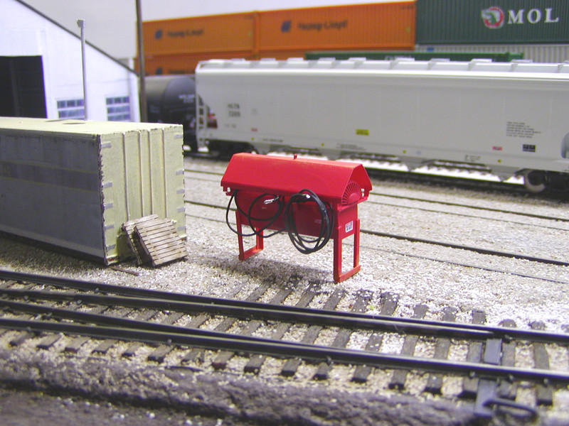 Finishing touches on the load tester, with paint, decals, cables, and weathering.
