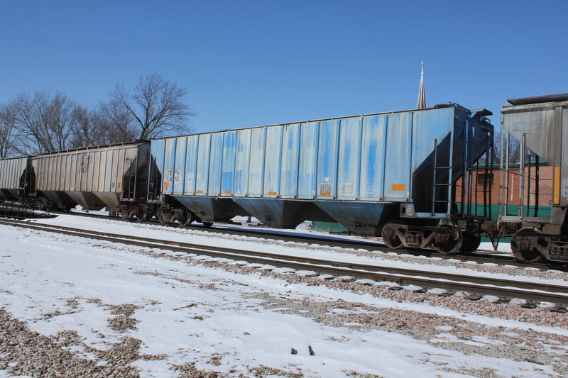 There were several interesting hoppers on this train, fertilizer cars from Hills I think.
