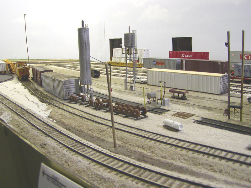 Overall view of the engine facility.  It's amazing how many grounded box cars are needed for shop supplies even for such a small facility.  Besides the three visible here, there's one more I won't have room to model, as well as a grounded 40' trailer used for electrical supplies on the north end of the shop.