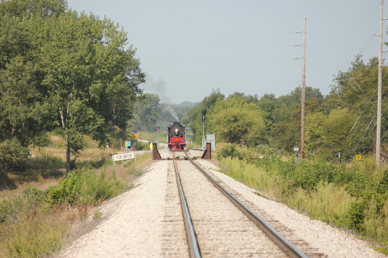 With the long lens at Yocum, while the steam crew is putting a geep on the back of the train.