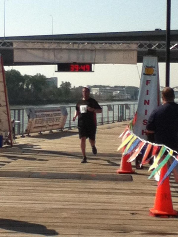 My biggest accomplishment of the week:  I took up running 10 days ago with my 21-year-old son to help him prepare for a half-marathon in September, and we ran our first 5K race this morning.  I didn't set any records, but I made it without walking, with an official net time of 38:21.  400th place out of 488 is nothing to write home about, but it felt good. Not sure my 46-year-old knees are up for that half-marathon. :-)