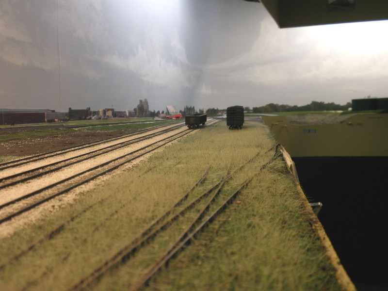 Layout view looking west.  The previous prototype pic was taken five years after my era, after they'd cleared off #4 track a bit to allow transload operations there.