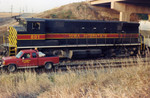 IAIS 801, on the Wilton local, with a car derailed at the JM switch, N.Star Siding, Nov. 11, 1994.