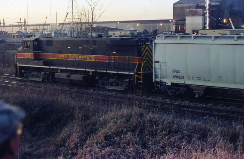 IAIS 801, N. Star siding, with North Star Steel in the background, Nov. 11, 1994.