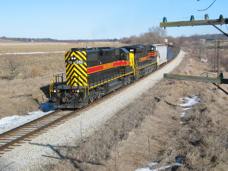 Westbound at the MP 215 curve east of Atalissa, Jan 17, 2013.  I saw a post on Trainorders a while back where someone had climbed this tree for a shot here- not a bad idea!  My excitement at hearing 150 was on the point was tempered when I saw it come around the curve long hood first, dang it!