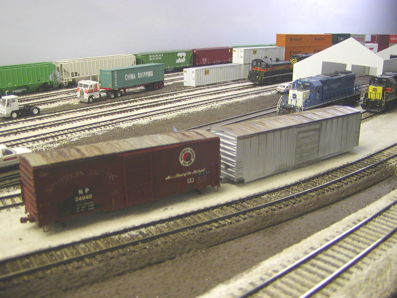 Overall view of the Bluffs engine facility and yard showing both toolshed boxcars and the under-construction enginehouse.