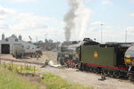 Pulling past the Bluffs enginehouse.