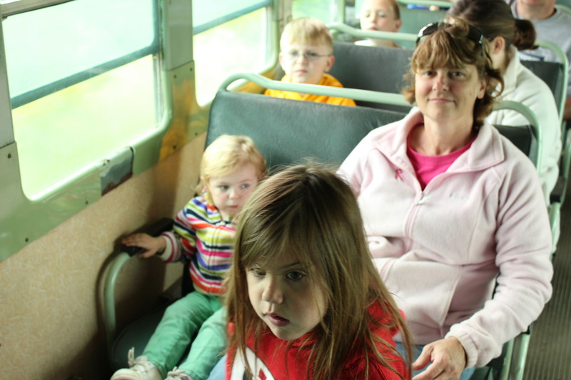 Claire, Rece and Grandma have found a seat.