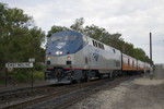 The Amtrak special exits the BNSF Industrial at 7th St East Moline, IL on 13-May-2007.