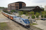 The Amtrak special heads east through downtown Moline, IL 13-May-2007.