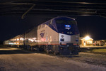 A chartered Amtrak train using MILW 261 equipment sits in BNSF's Lower Yard under the Centennial Bridge.  Rock Island, IL 12-May-2007.