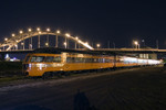 A chartered Amtrak train using MILW 261 equipment sits in BNSF's Lower Yard under the Centennial Bridge.  Rock Island, IL 12-May-2007.