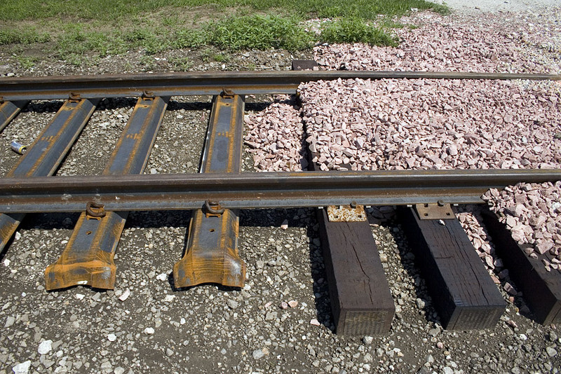 Steel verses wood tie at private crossing on new Annawan siding.   August 10, 2007.