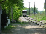 Beginning the long backup move to Bureau, past the Peoria yard board.