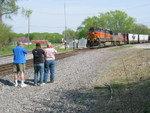 The BN dispacher held the special at Colona for one of his westbounds.  3 brave railfans "get the shot"