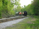 Business train comes around the curve at the east end of Bureau, mp114, April 20, 2010.
