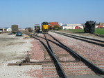 After tieing the loads down on the branch, the crew has shoved the 3 ballast cars into the yard and tied everything down for the WB crew to grab on their way to the Bluffs.