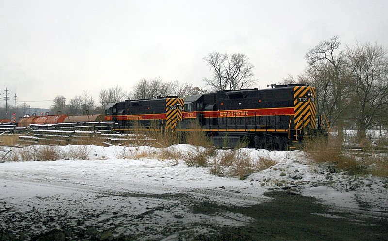 IAIS 713 & 720 back into the south end of the EJ&E yard from the RI ,